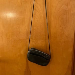 Baggu small genuine leather crossbody bag. Exterior pocket.